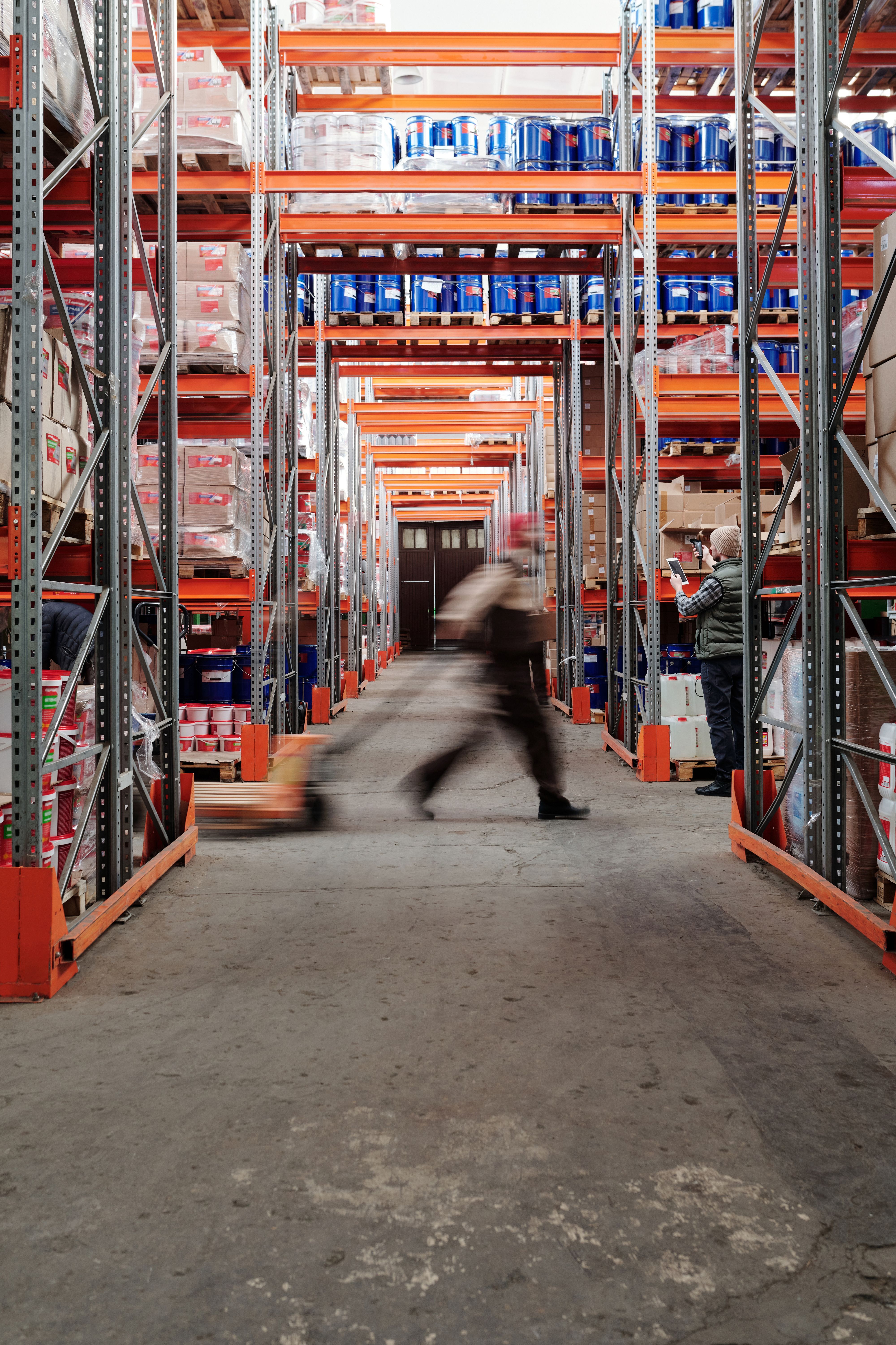 Warehouse team managing stored goods and inventory